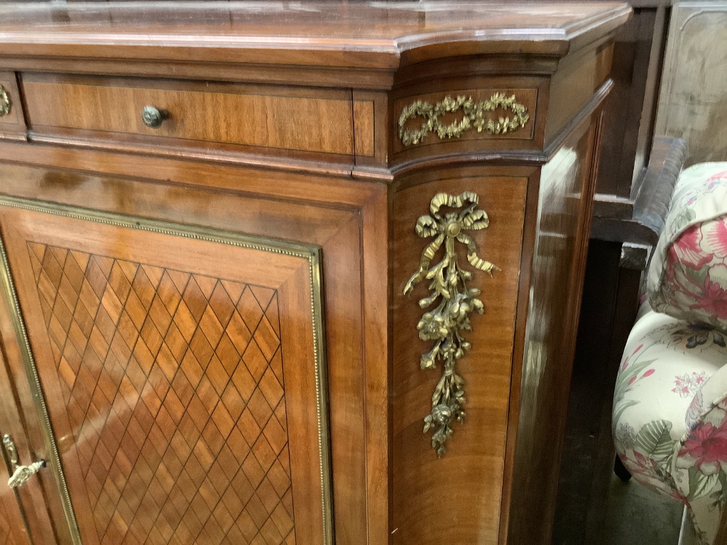 A Louis XVI style gilt metal mounted mahogany side cabinet, width 110cm depth 46cm height 110cm